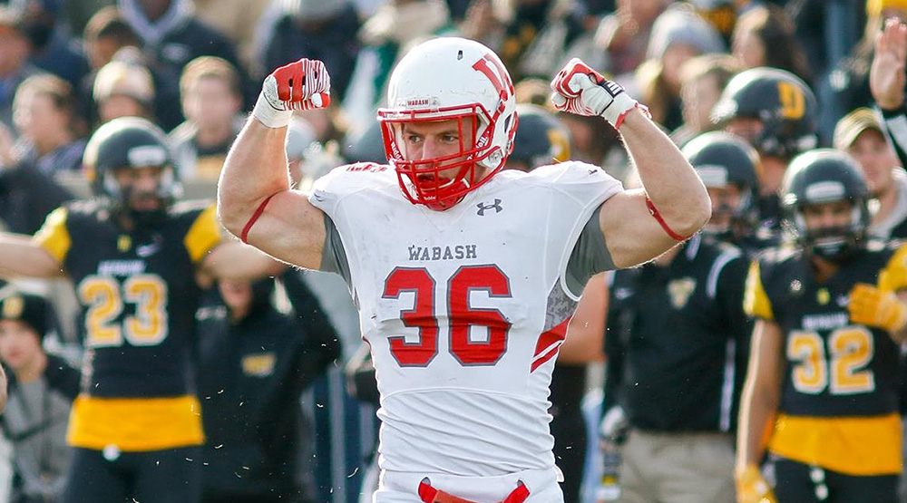 Evan Hansen, flexing his muscles after a play in a Monon Bell game.
